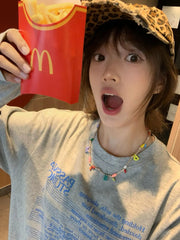 Lunivop Autumn And Winter New Loose Sheet Music Pattern Printed Long Sleeve T-Shirt Top Y2K Millennial Style Top For Women