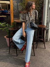 Lunivop Elegant O-Neck Hollow Out Lace Up Shirt Women Chic Solid Short Sleeved Tops Female 2025 Spring Fashion Summer Blouse Streetwear